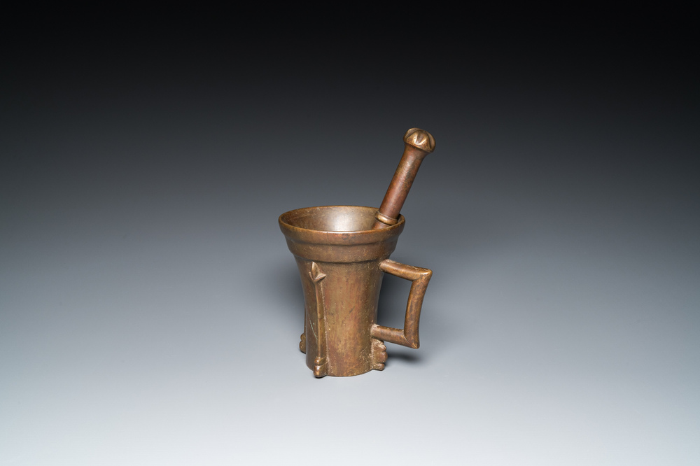 A large German bronze mortar and pestle, Nuremberg, 15th C.