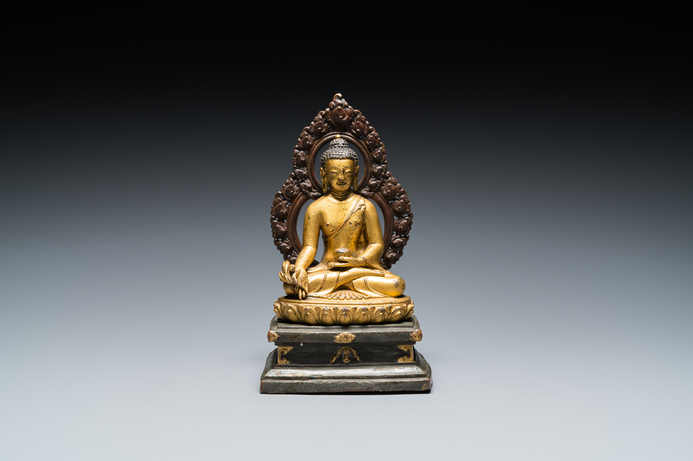 A Sino-Tibetan gilt and silvered copper alloy Medicine Buddha or Bhaishajyaguru, 19th C.