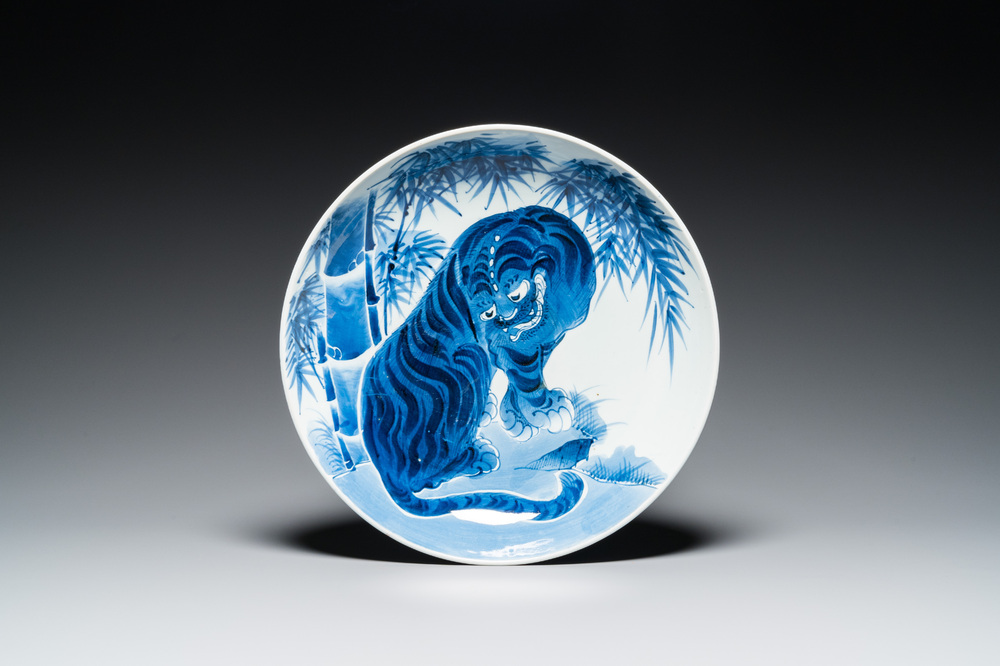 A large Japanese Arita blue and white 'tiger' dish, Fuuki Chousun 富貴長春 mark, 18/19th C.
