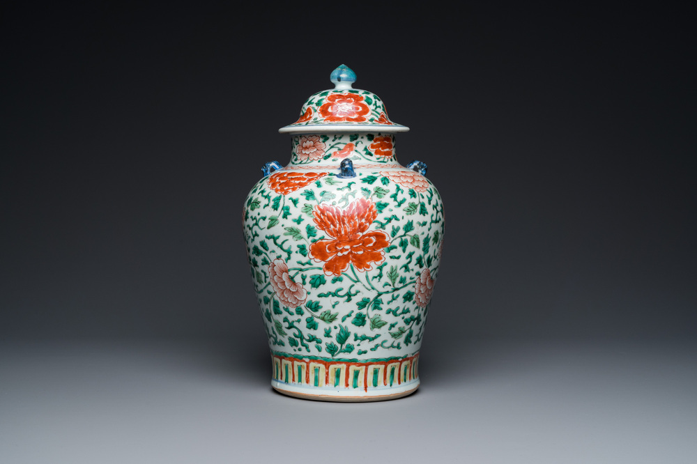 A Chinese 'peony scroll' famille verte vase and cover, Kangxi