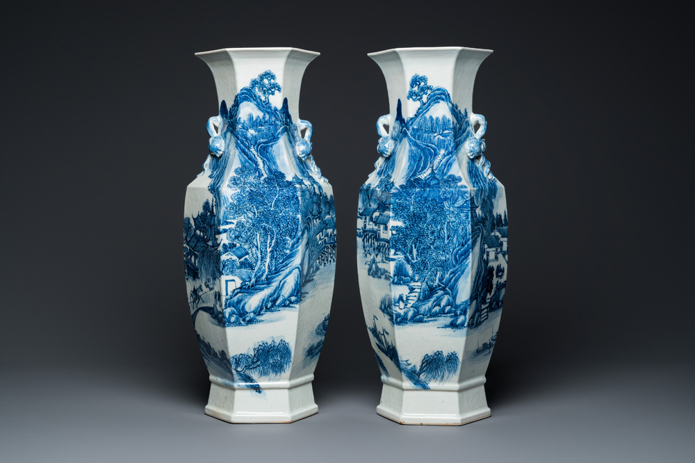 A pair of Chinese blue and white hexagonal 'mountainous landscape' vases, 19th C.