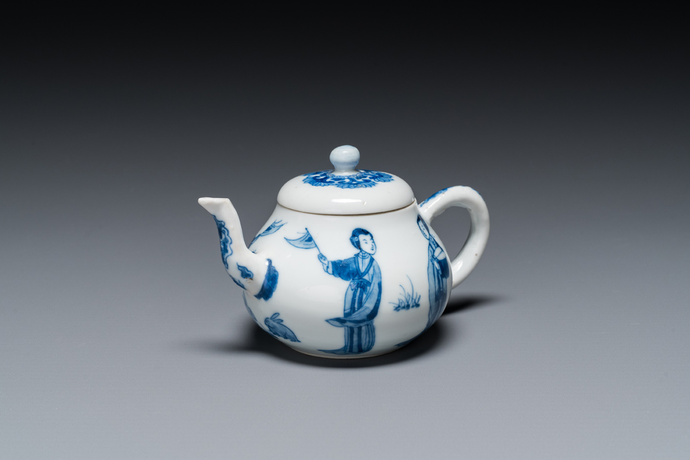 A Chinese blue and white 'Long Eliza' teapot and cover, Chenghua mark, Kangxi