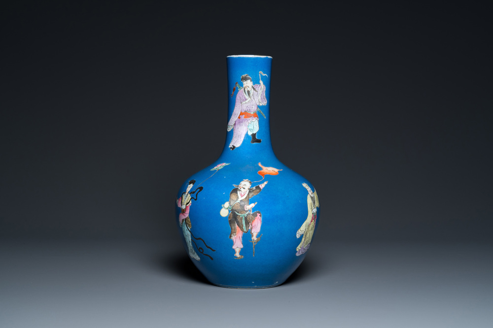 A Chinese blue-ground famille rose 'eight immortals' bottle vase, Qianlong mark, 19th C.