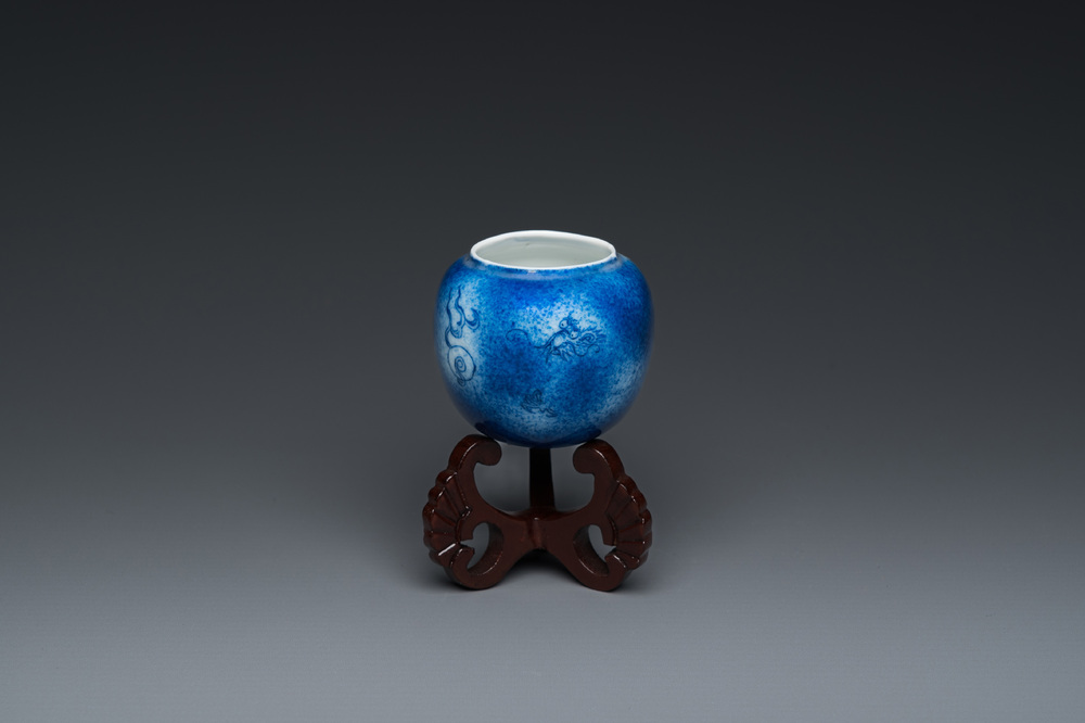 A Chinese powder-blue-glazed bird feeder with a dragon, 19th C.