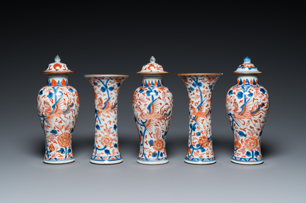 A Chinese grisaille garniture of five 'phoenix' vases, Kangxi/Yongzheng