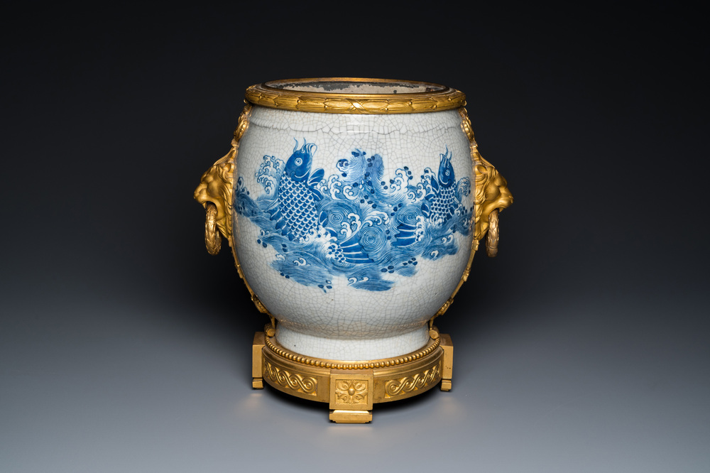 A large Chinese blue and white crackle-glazed 'carps' vase with fine gilt bronze mounts, 18/19th C.