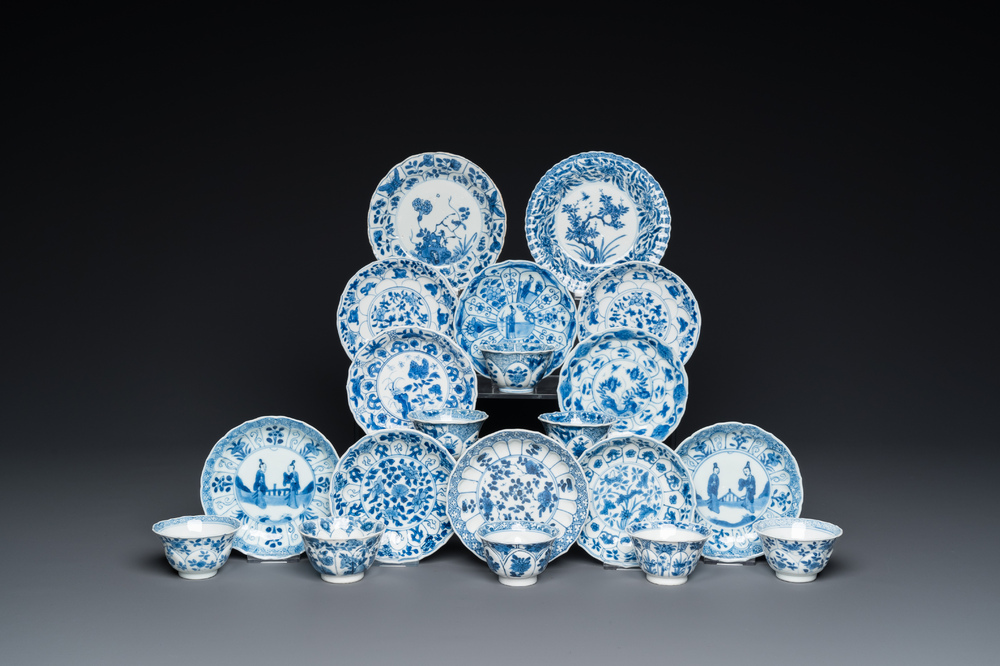 Twelve Chinese blue and white saucers and eight cups, Kangxi