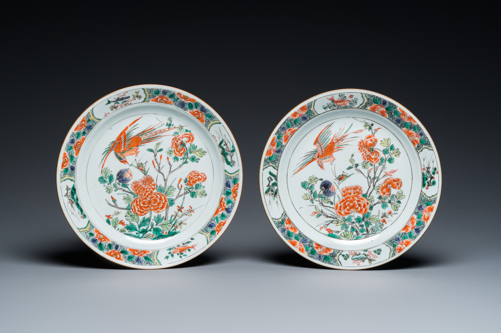 A pair of Chinese famille verte plates with a bird above a peony bush, Kangxi