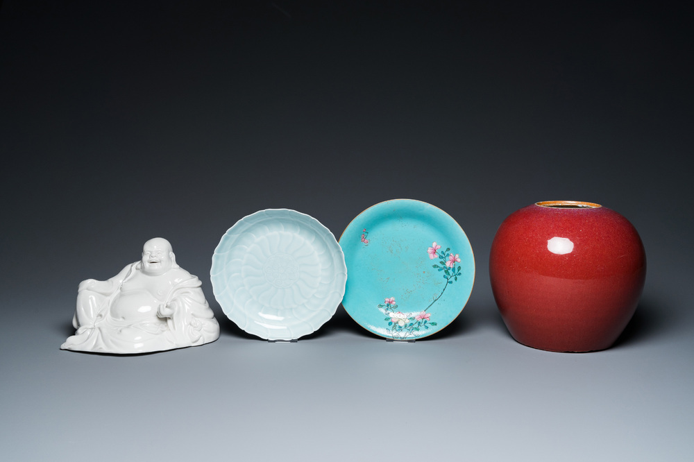 A Chinese sang-de-boeuf-glazed jar, a blanc de Chine Buddha and two plates, 19th C.