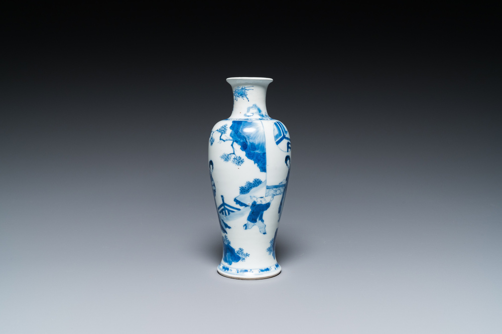 A Chinese blue and white 'two ladies and a boy' vase, Kangxi