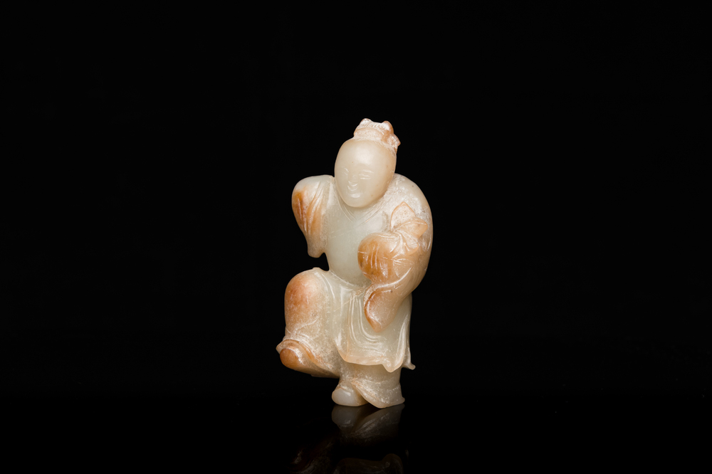 A Chinese jade sculpture of a boy, 18/19th C.