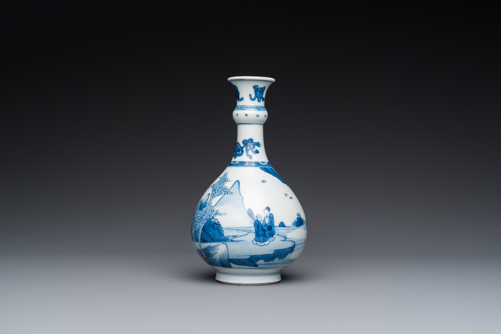 A Chinese blue and white bottle vase with figures in a landscape, Kangxi