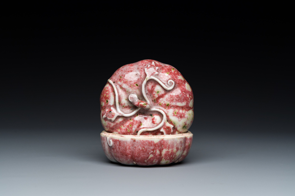 A Chinese peachbloom-glazed pumpkin-shaped box and cover, 19th C.