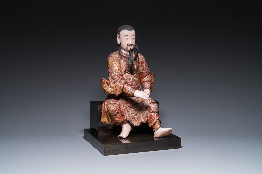 A large Chinese lacquered and polychromed wood sculpture of Guandi, 18th C.