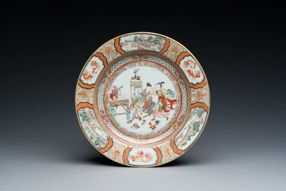 A Chinese famille rose plate with musicians playing the drums, Yongzheng