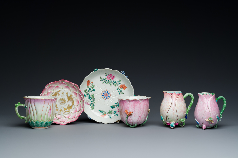 Two Chinese relief-decorated famille rose 'lotus' cups and saucers and two jugs, Yongzheng
