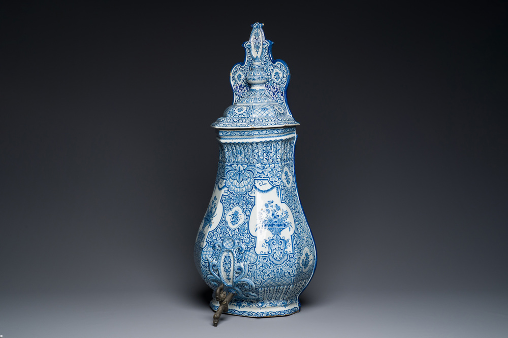 A massive Dutch Delft blue and white cistern and cover, 1st half 18th C.