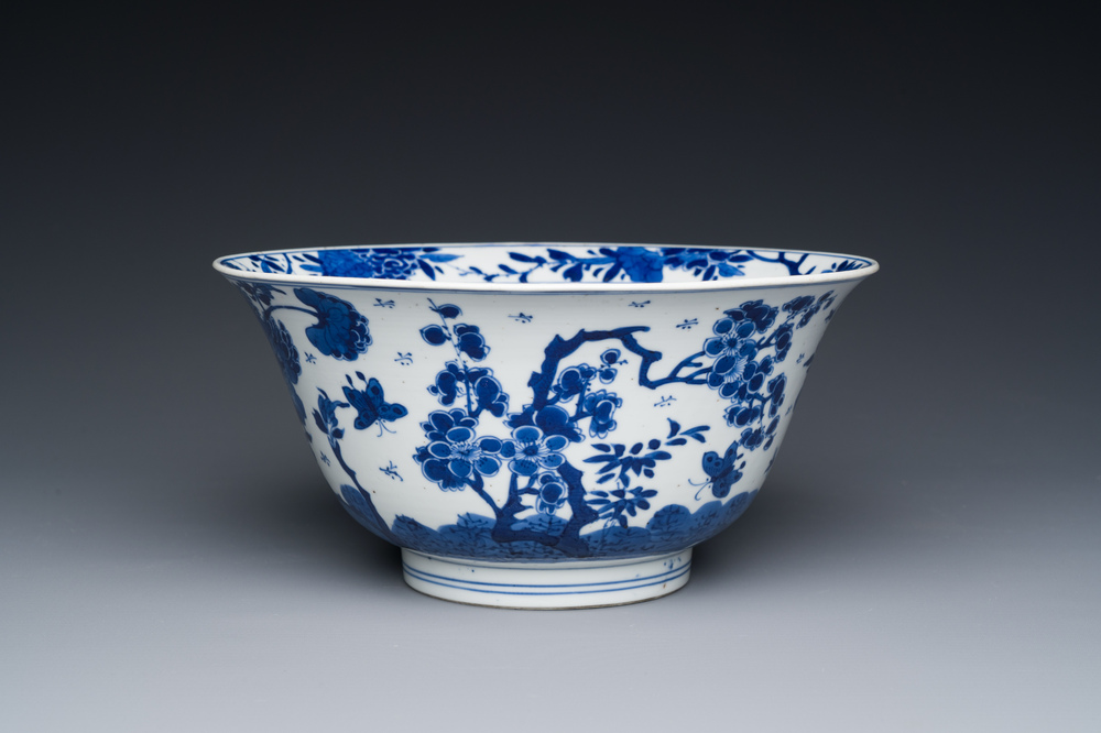 A Chinese blue and white bowl with floral 'four seasons' decoration, Chenghua mark, Kangxi