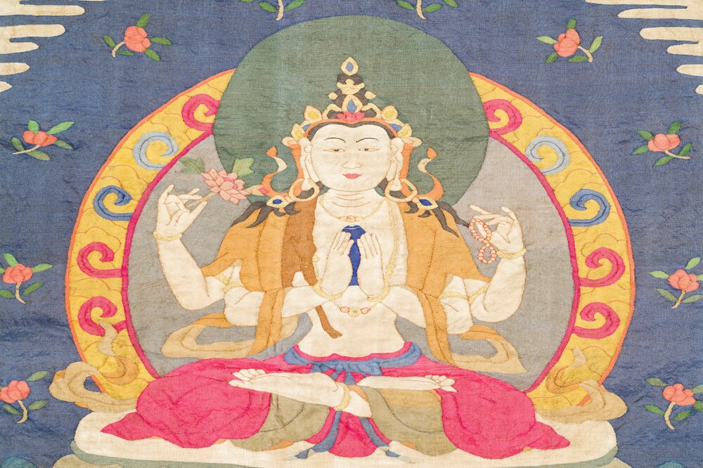 A Chinese kesi silk weaving depicting 'Buddha sitting on a lotus throne', Qing