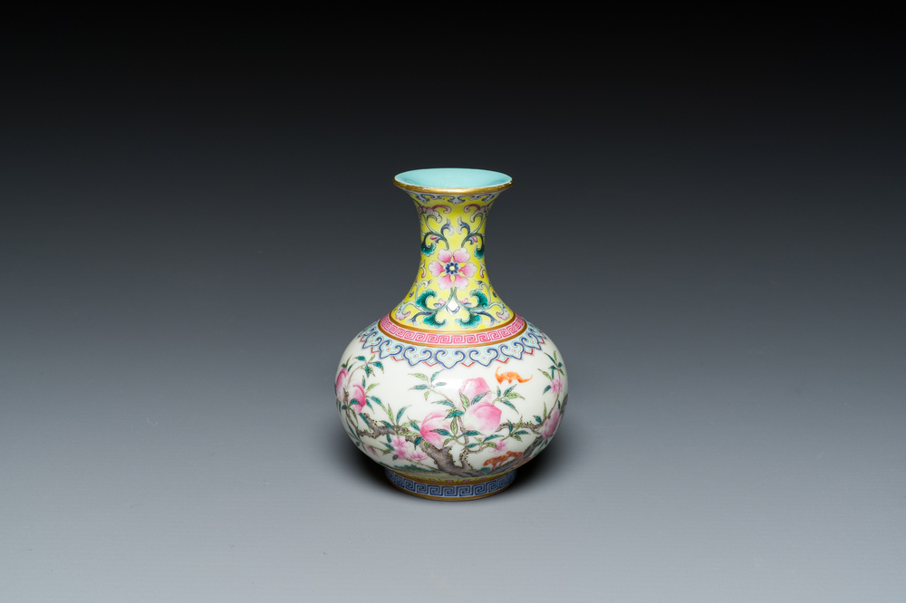 A small Chinese famille rose 'nine peaches' bottle vase, Jiaqing mark, 20th C.