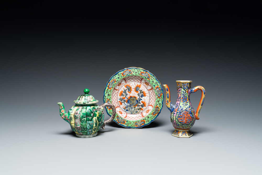 A Chinese clobbered blue and white ewer, a plate and a verte biscuit teapot, Kangxi