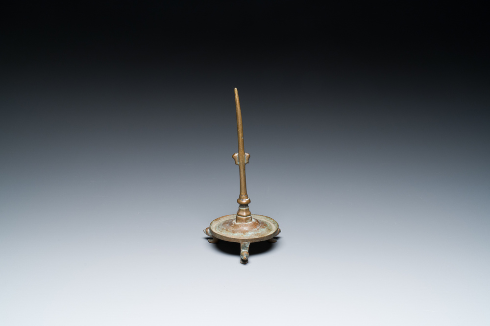 A bronze tripod pricket candlestick, the Low Countries, 14/15th C.