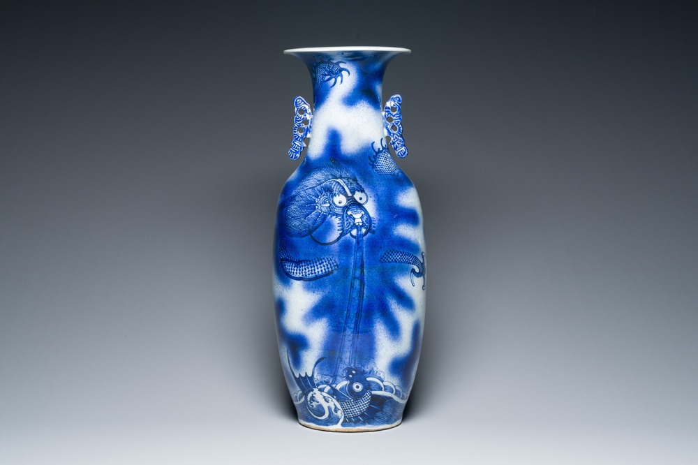 A Chinese blue and white 'dragon and carp' vase, 19th C.