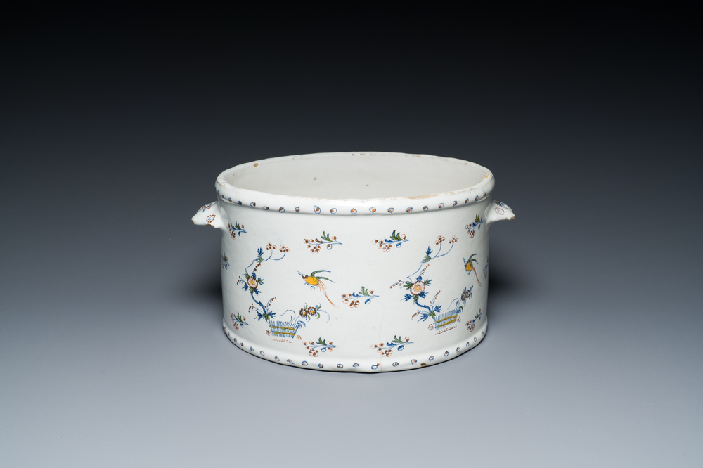 A polychrome Brussels faience cooler with '&Agrave; la haie fleurie' decoration, 18th C.