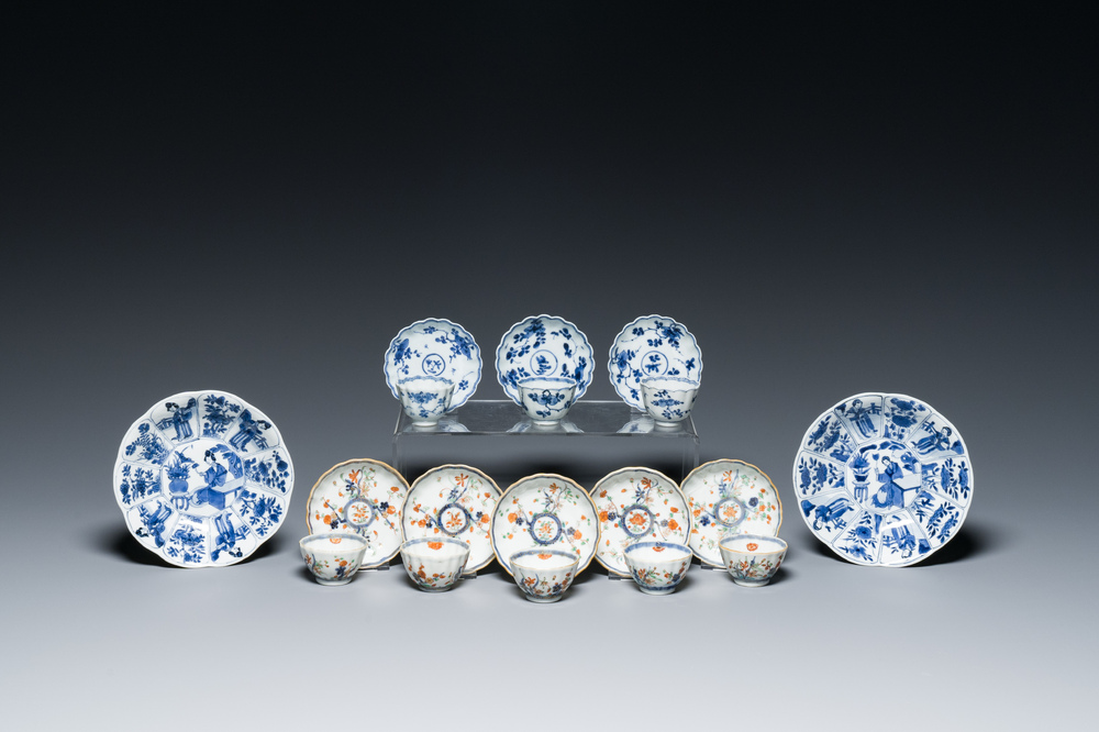 Two Chinese blue and white plates, three cups and saucers and five famille verte cups and saucers, Kangxi