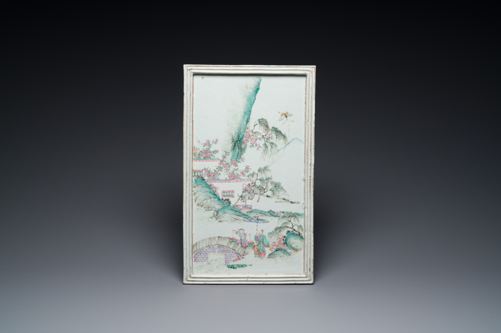 A Chinese rectangular famille rose tray with figures in a mountainous landscape, 19th C.