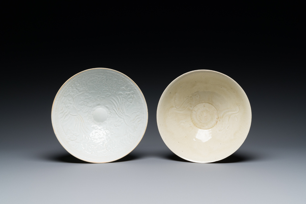 A Chinese qingbai-glazed 'phoenixes' bowl and a cream-glazed 'fish' bowl, probably Song