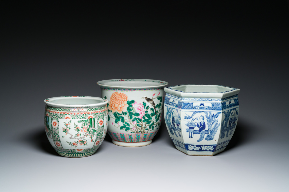 Three Chinese blue and white, famille rose and famille verte fish bowls and jardini&egrave;res, 19th C.