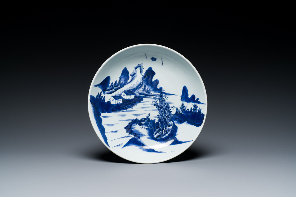 A Chinese blue and white dish with a scholar in a landscape, Yongzheng/Qianlong