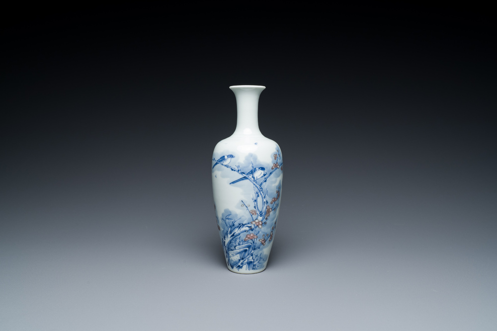 A Chinese blue, white and copper-red 'magpie and prunus' vase, Kangxi mark, 19/20th C.