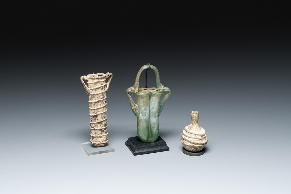 Two Roman glass balsamariums and a flask, 2nd/4th C.