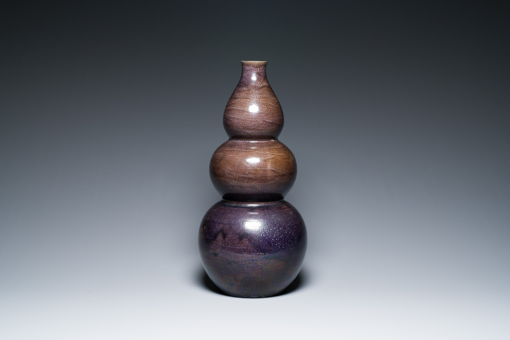 A large Chinese aubergine-glazed triple gourd vase, 18th C.