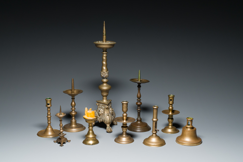 A varied collection of ten brass and bronze candlesticks, Western Europe, 15th C. and later