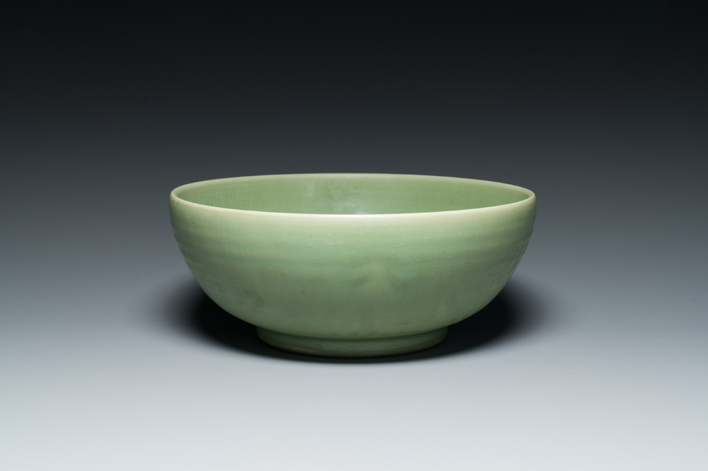 A Chinese Longquan celadon bowl with underglaze floral design, Ming