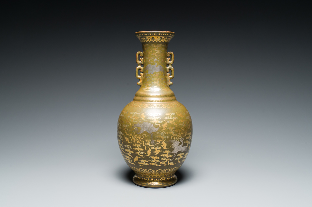 A Chinese gilt- and silver-decorated teadust-glazed vase with bats and cranes among clouds, Qianlong mark, Republic