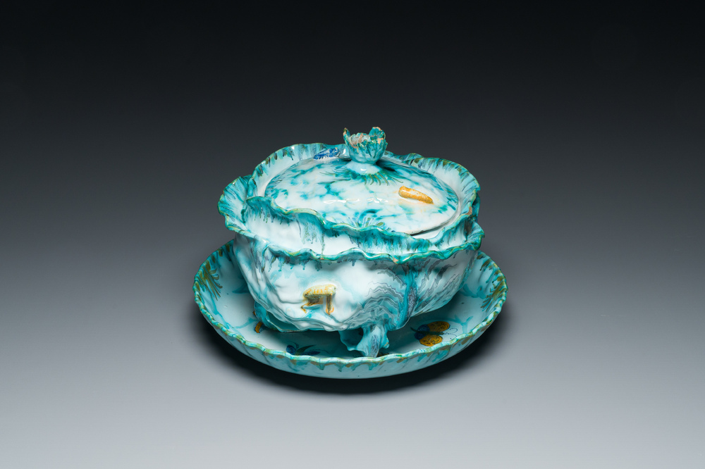 A polychrome Brussels faience 'caterpillars' tureen and cover on a 'butterfly' stand, 18th C.