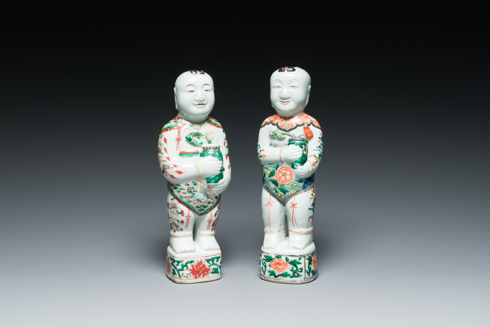 A pair of Chinese famille verte 'Hehe Er Xian' figures, Kangxi
