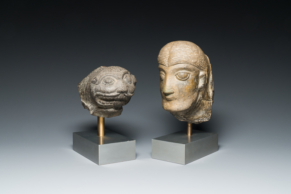 A Romanesque carved stone head of a man and a lion's head, probably Flanders, 13/15th C.