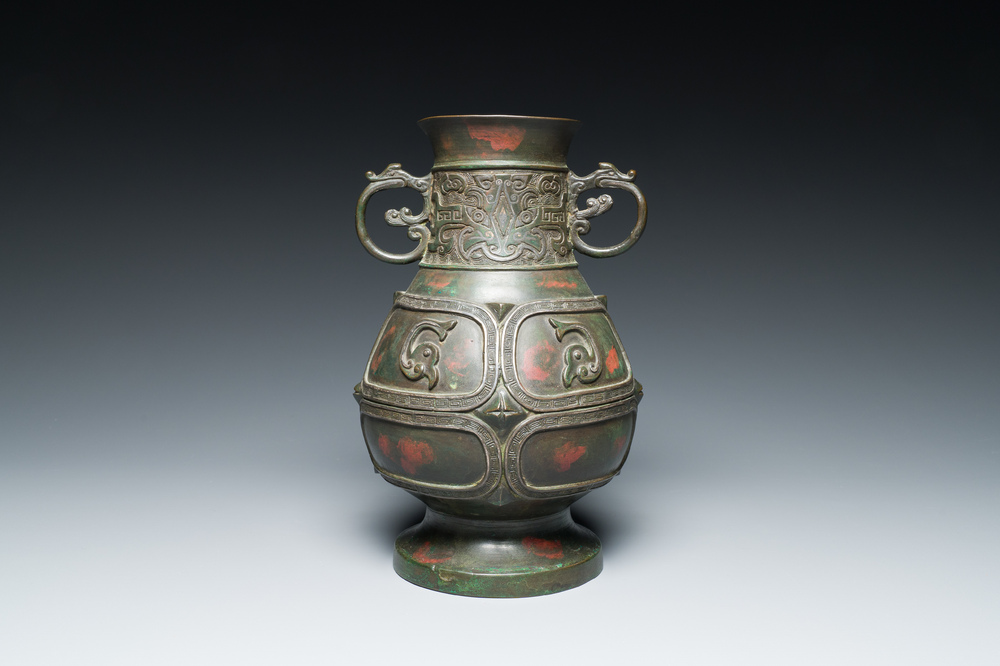 A Chinese gold and silver-inlaid bronze vase with pseudo-rust patina, 18th C.