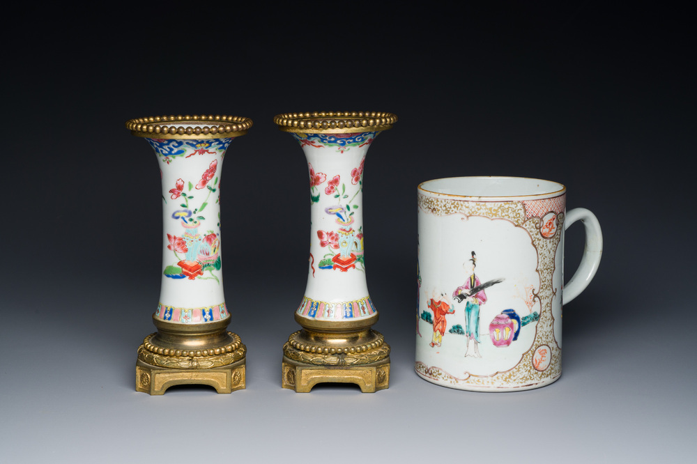 Une paire de vases en porcelaine de Chine famille rose aux montures en bronze dor&eacute; et une chope &agrave; sujet mandarin, Qianlong