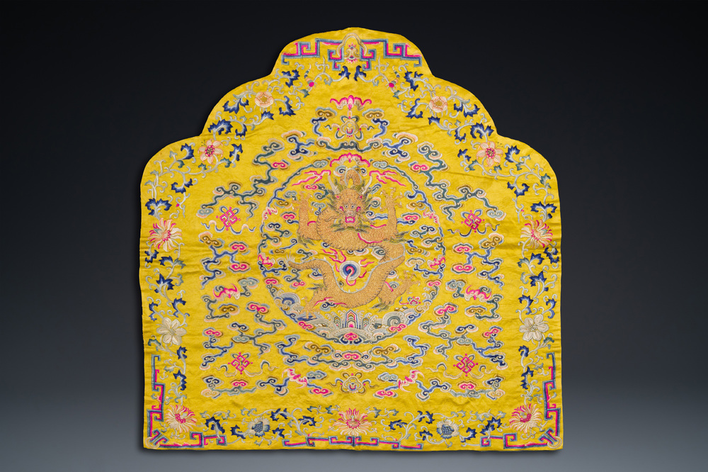 An imperial Chinese embroidered silk gold-thread yellow-ground cushion cover, 19th C.