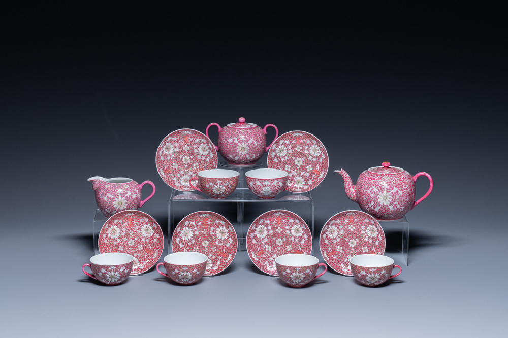 A Chinese 15-piece tea service with lotus scrolls on a purple ground, Guangxu mark, 20th C.