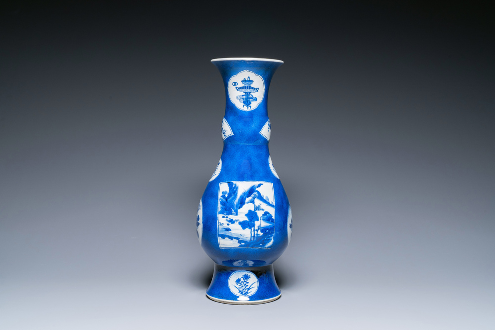 Een Chinese poederblauwe flesvormige vaas met landschapspanelen, Kangxi