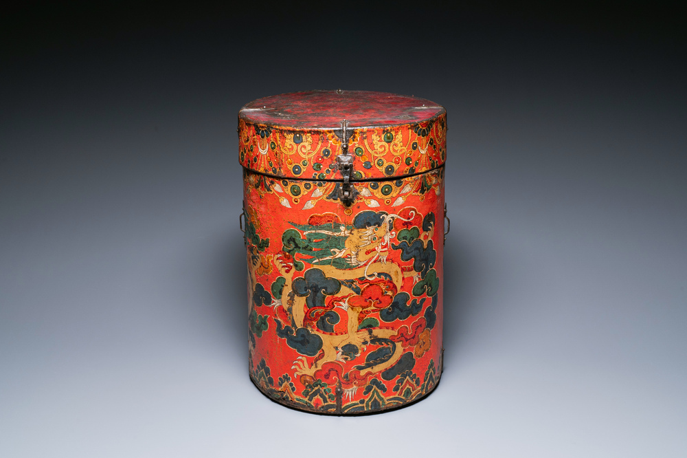A large leather-clad wooden box and cover painted with dragons on a red ground, Tibet, 17/18th C.