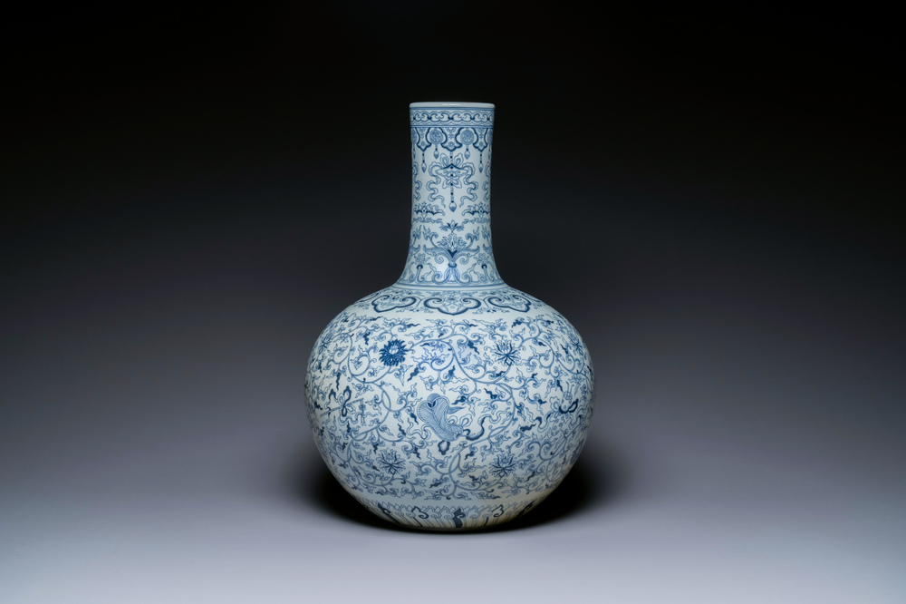 A large Chinese blue and white bottle vase, Qianlong mark, 19/20th C.