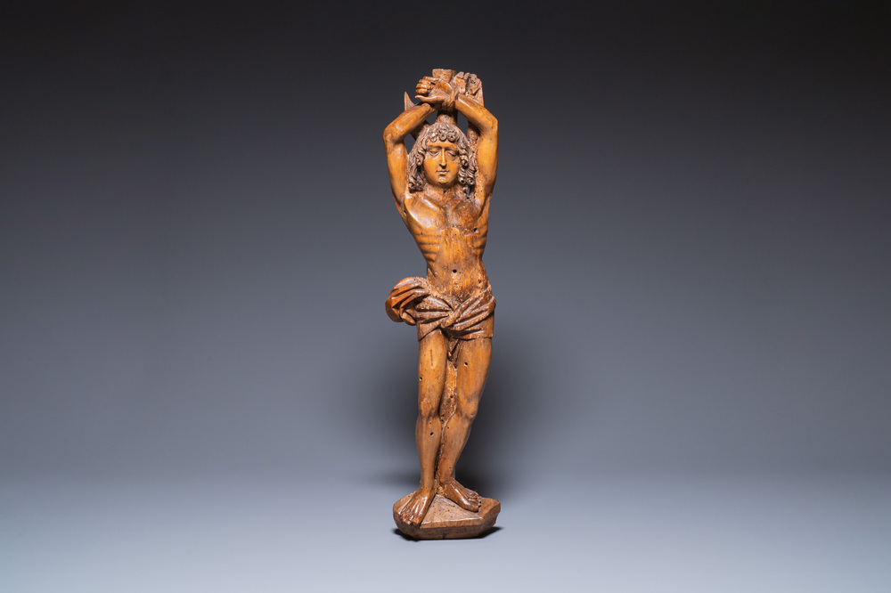 A large German basswood sculpture of Saint Sebastian, probably Lower Rhine, 16th C.
